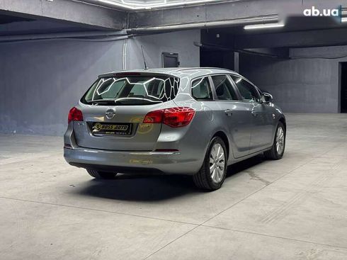 Opel Astra 2013 - фото 6