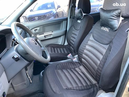 Kia Carens 2003 бежевый - фото 29