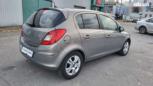 Opel Corsa 2013 - фото 20