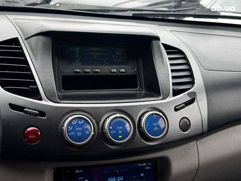 Mitsubishi l 200 2009 черный - фото 16