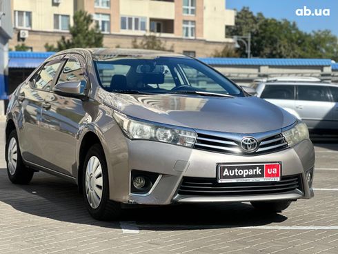 Toyota Corolla 2013 коричневый - фото 10