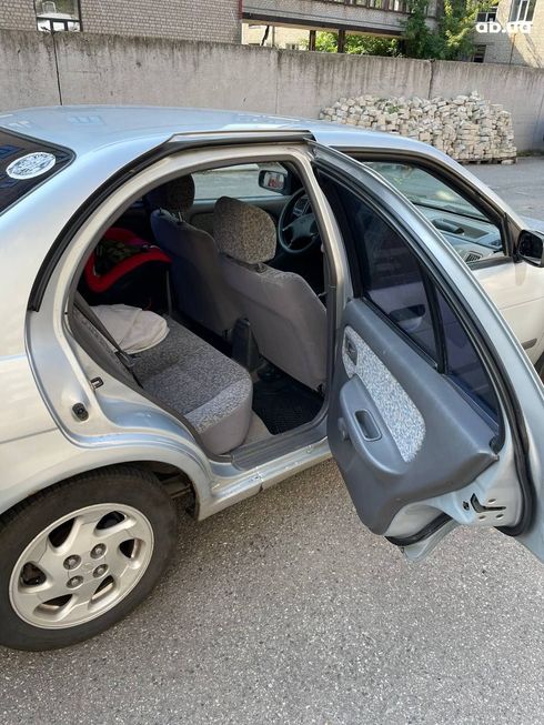 Nissan Almera 1998 серебристый - фото 4