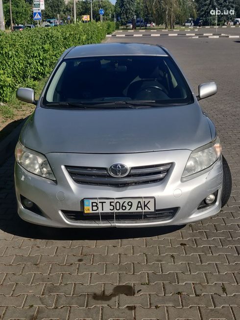 Toyota Corolla 2008 серебристый - фото 8