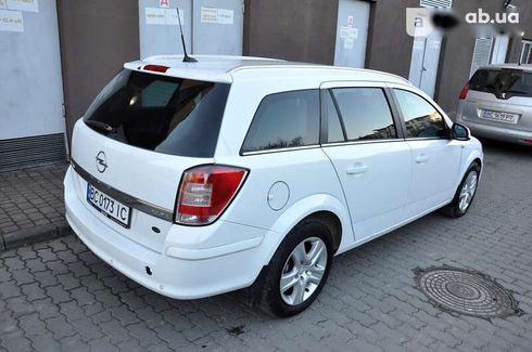 Opel Astra 2010 - фото 9