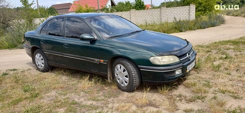 Opel Omega 1994 зеленый - фото 5