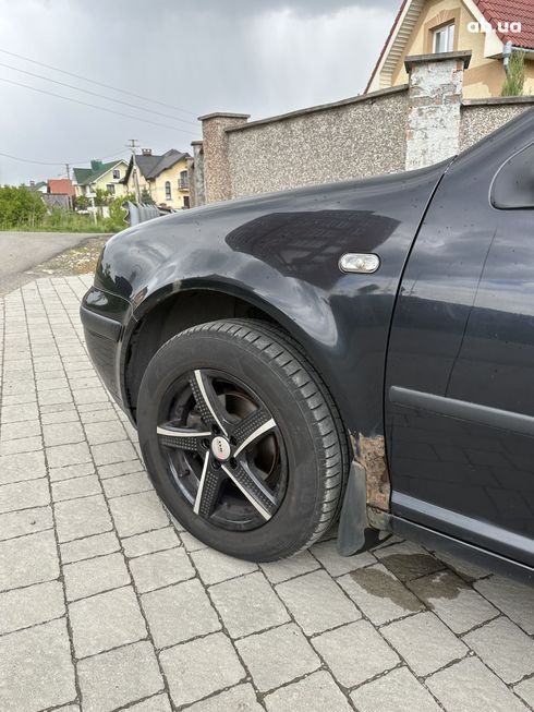 Volkswagen Golf 2001 черный - фото 7