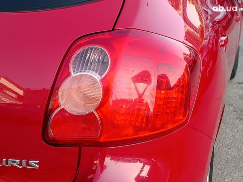Toyota Auris 2007 красный - фото 9
