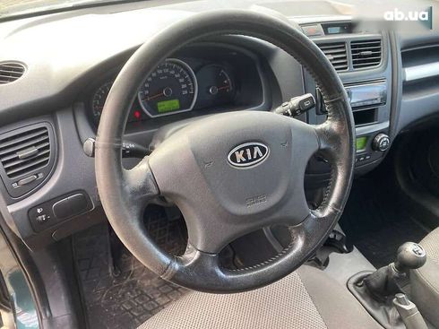 Kia Sportage 2008 - фото 14