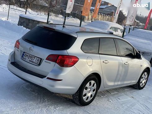 Opel Astra 2011 - фото 15