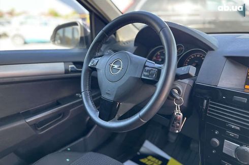 Opel Astra 2010 - фото 28
