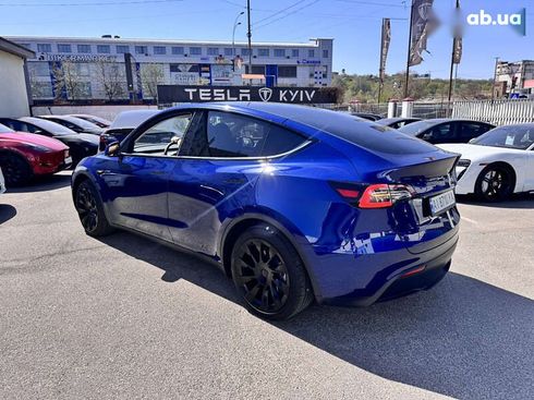 Tesla Model Y 2024 - фото 21