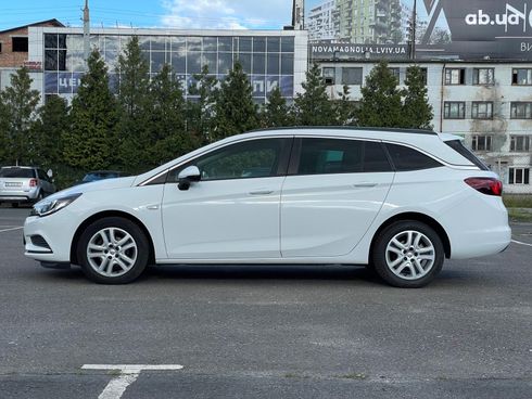 Opel Astra 2018 белый - фото 9