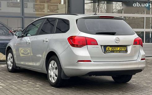 Opel Astra 2014 - фото 4