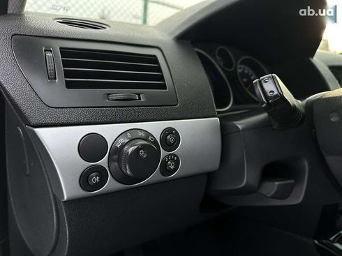 Opel Astra 2010 - фото 23
