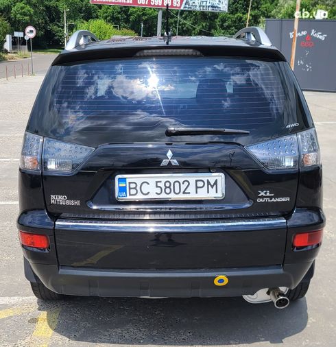 Mitsubishi Outlander XL 2011 черный - фото 2