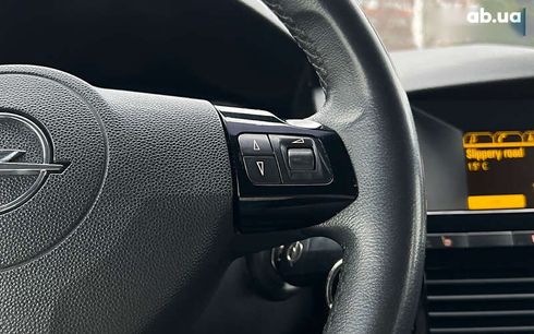 Opel Astra 2010 - фото 12