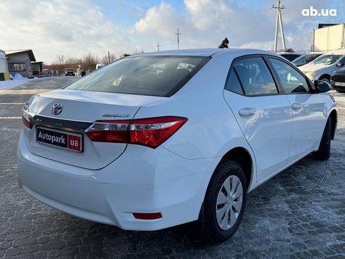 Toyota Corolla 2014 белый - фото 6