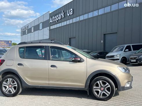 Renault Sandero 2019 бежевый - фото 29