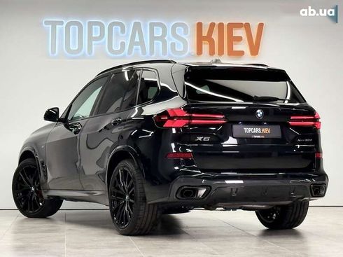BMW X5 2025 - фото 17