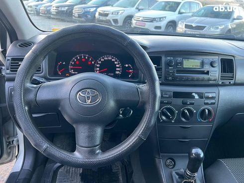 Toyota Corolla 2004 серый - фото 21