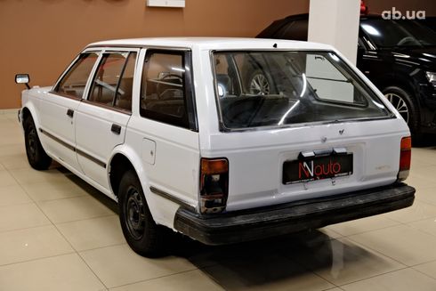 Nissan Bluebird 1987 белый - фото 5