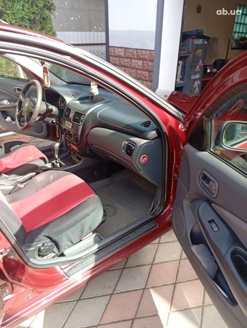 Nissan Almera 2004 вишневый - фото 5