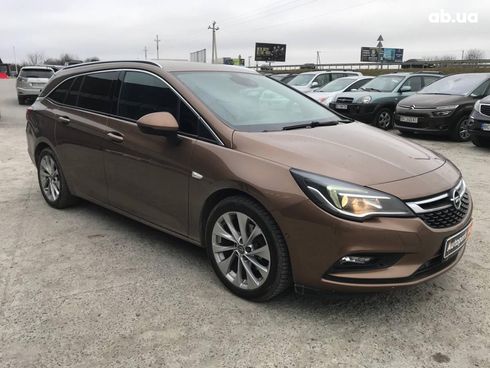 Opel Astra 2016 коричневый - фото 13