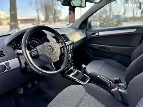 Opel Astra 2010 - фото 20