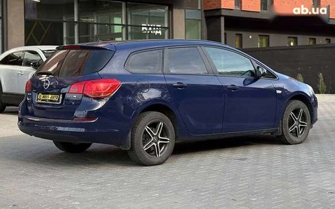 Opel Astra 2011 - фото 6