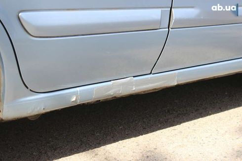 Nissan Almera 2005 - фото 10