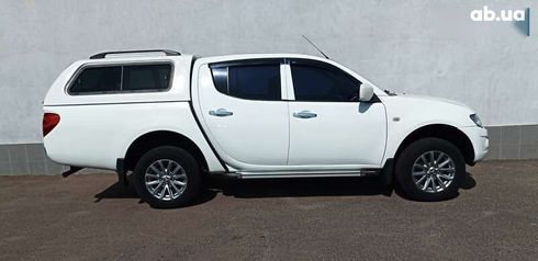 Mitsubishi l 200 2013 - фото 6