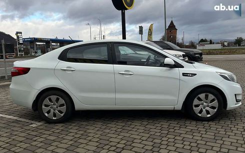 Kia Rio 2012 - фото 8
