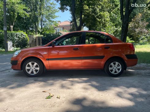 Kia Rio 2008 оранжевый - фото 12