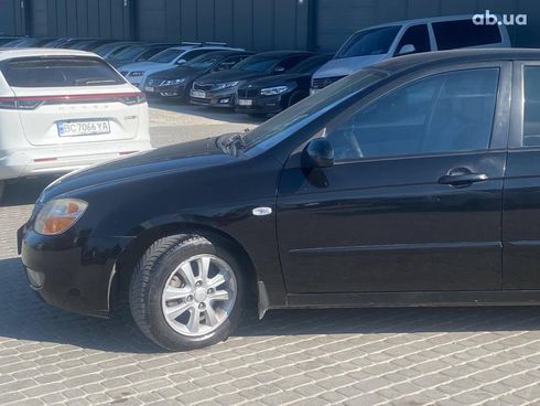 Kia Cerato 2008 черный - фото 2