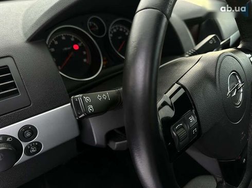 Opel Astra 2010 - фото 22