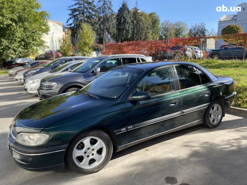 Opel Omega 1999 зеленый - фото 4