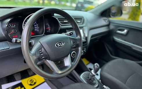 Kia Rio 2013 - фото 16