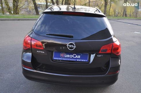 Opel Astra 2012 - фото 28