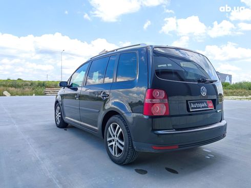 Volkswagen Touran 2010 черный - фото 11