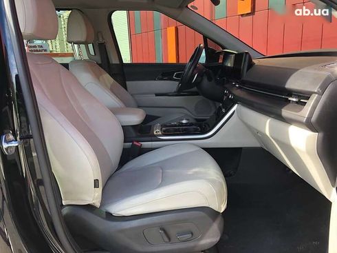 Kia Carnival 2021 - фото 11