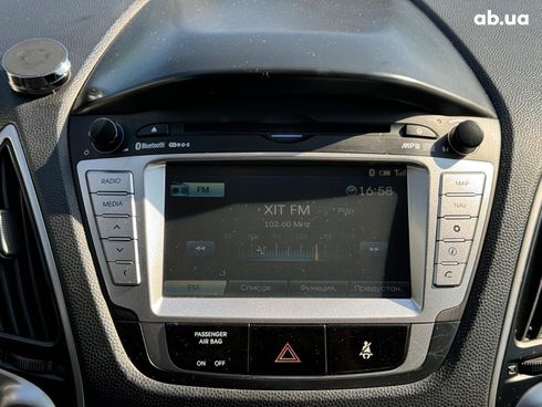 Hyundai ix35 2010 зеленый - фото 32