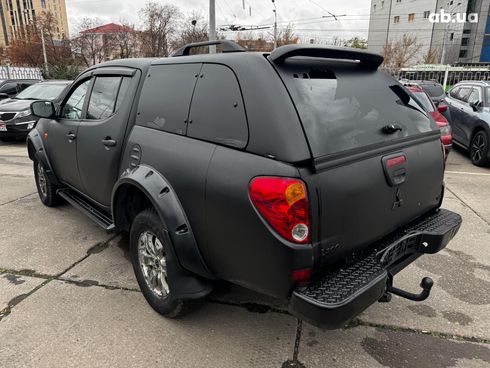 Mitsubishi l 200 2009 черный - фото 4