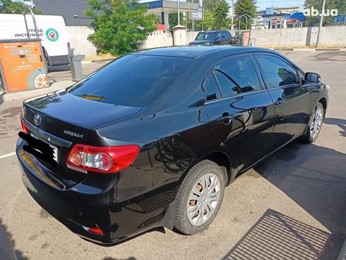 Toyota Corolla 2011 черный - фото 8