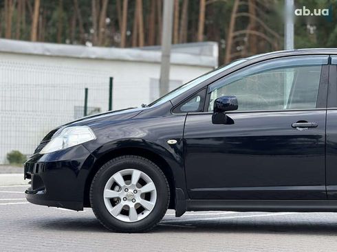 Nissan Tiida 2011 - фото 11
