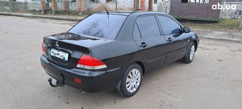 Mitsubishi Lancer 2008 черный - фото 3