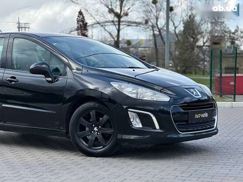 Peugeot 308 2011 - фото 14