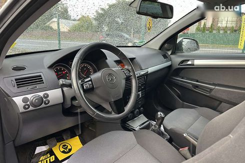 Opel Astra 2010 - фото 11