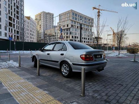 Nissan Almera 2001 - фото 10