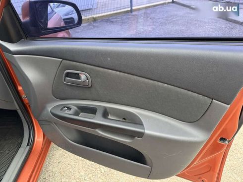 Kia Rio 2007 - фото 28