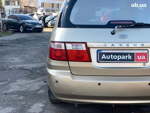 Kia Carens 2003 бежевый - фото 12